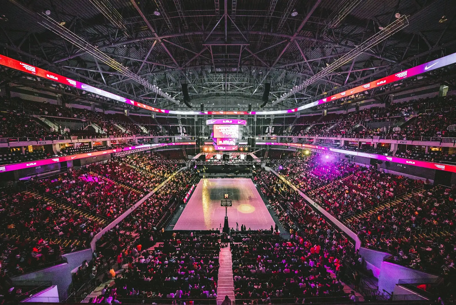 Packed arena crowd at a streetball tournament